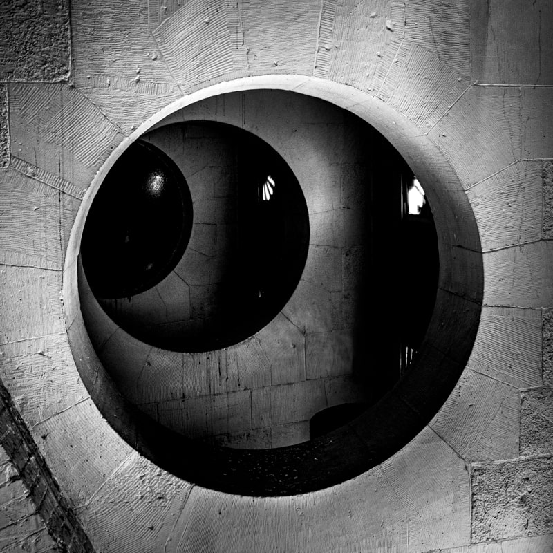 A black and white photo of a the supports inside the dome of St. Pauls Cathederal